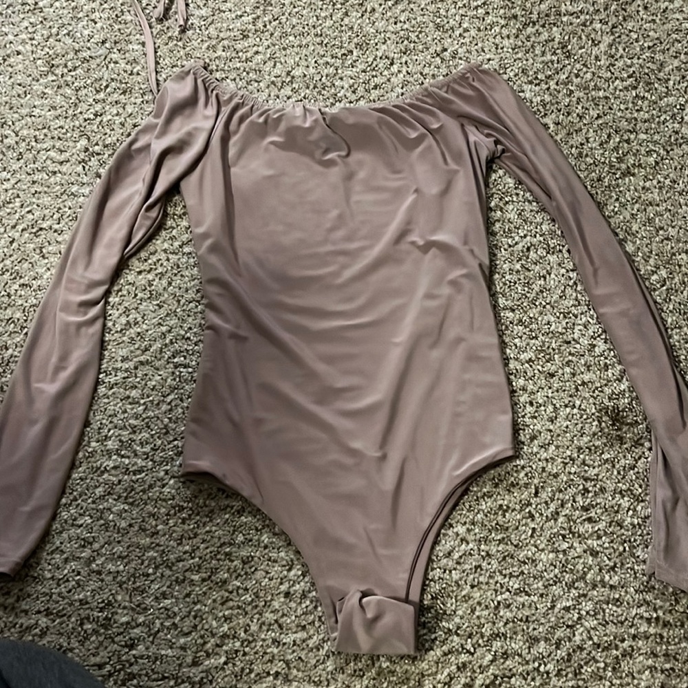 Pretty little thing off the shoulder body suit